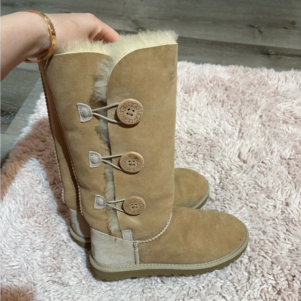 Tan Shearling Lined Boots With Button Accents - image 1